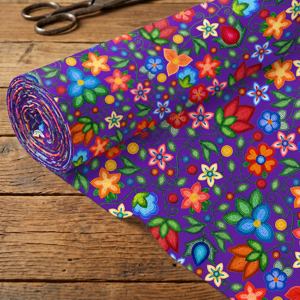 Morning Harmony Purple cotton poplin fabric rolled out on a wooden table