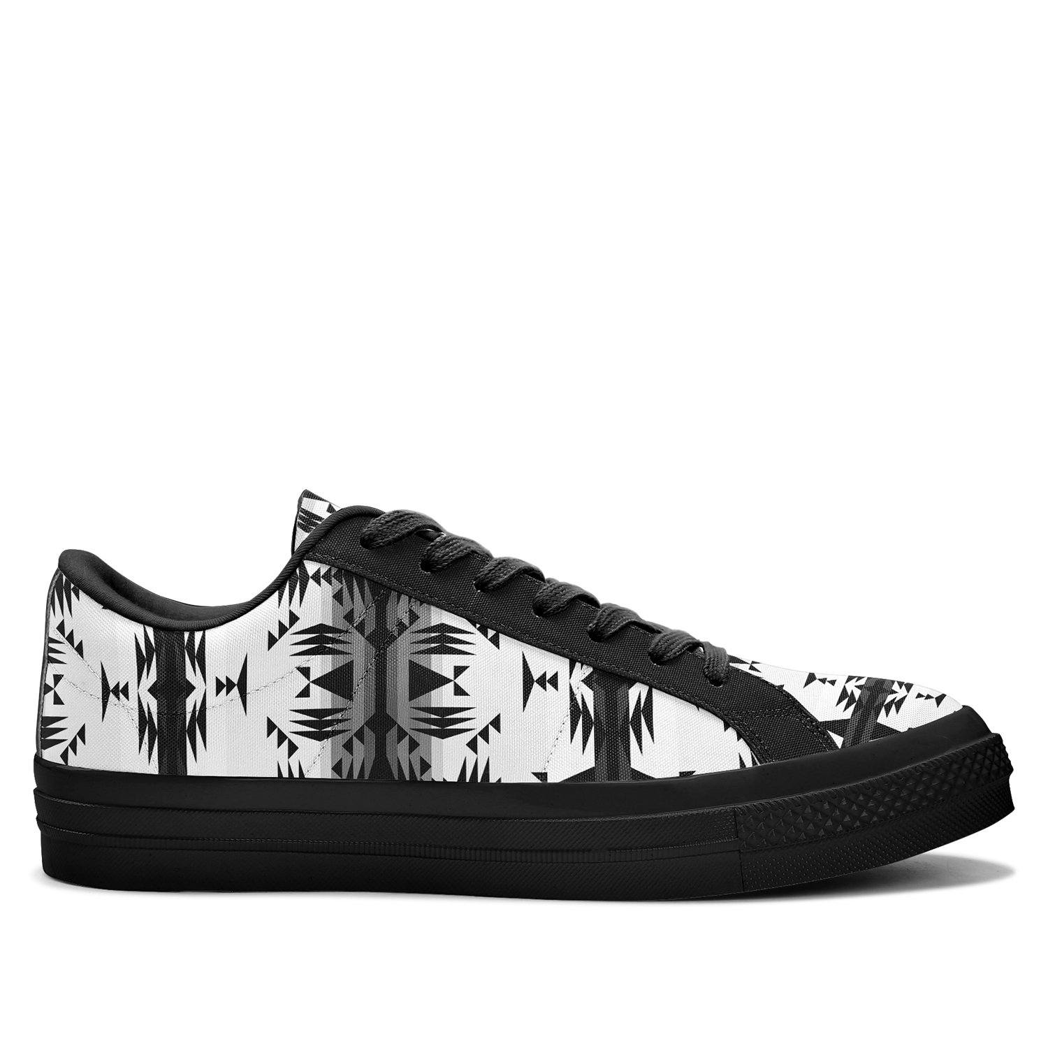 Between the Mountains White and Black Aapisi Low Top Canvas Shoes Black Sole 49 Dzine