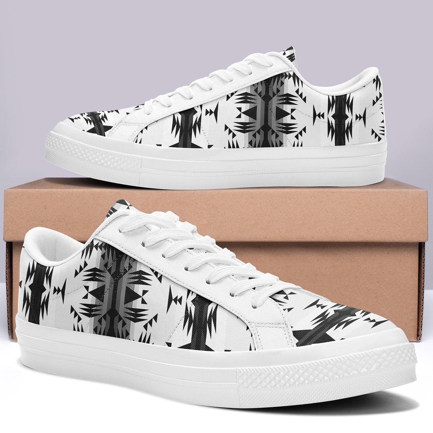 Between the Mountains White and Black Aapisi Low Top Canvas Shoes White Sole 49 Dzine