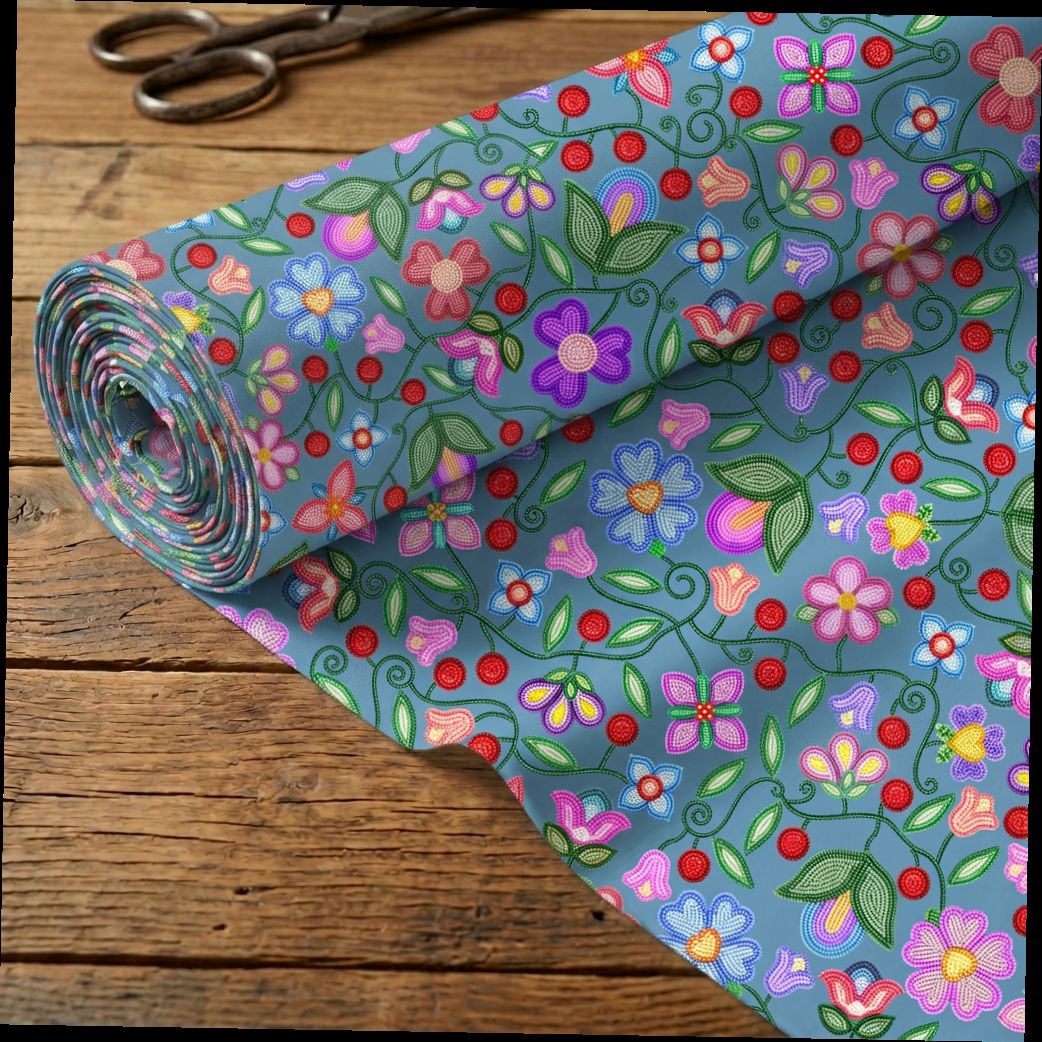 Petal Harmony River cotton poplin fabric rolled out on a wooden table