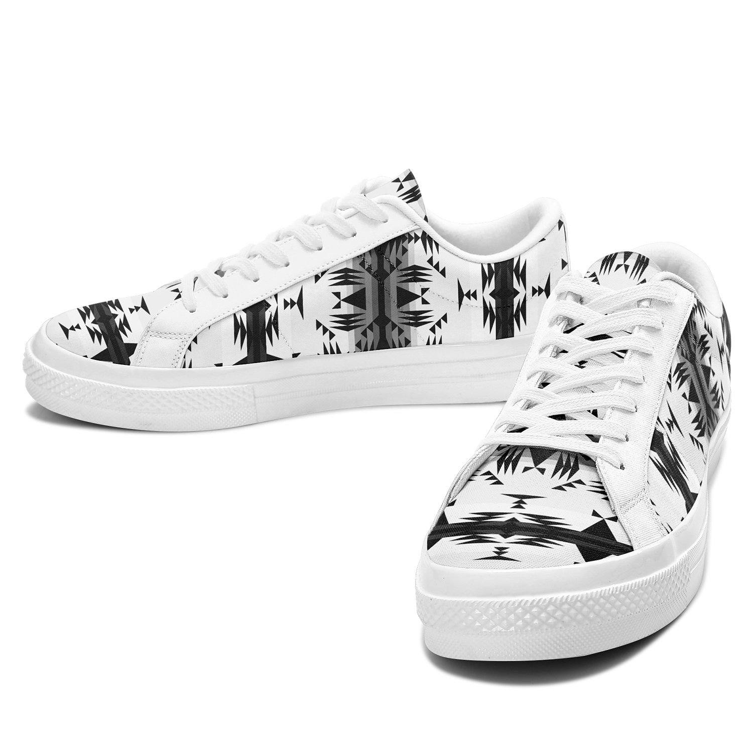 Between the Mountains White and Black Aapisi Low Top Canvas Shoes White Sole 49 Dzine 